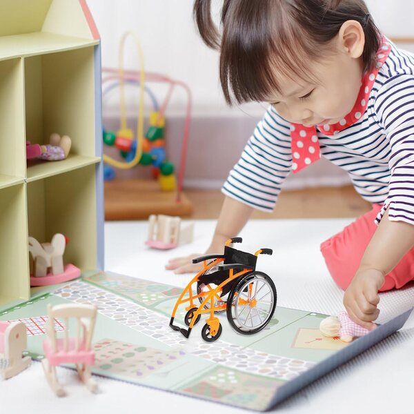 Zusammenklappbarer orangefarbener Kunststoff-Kinderwagen und Krücken für Puppen, Lernspiel